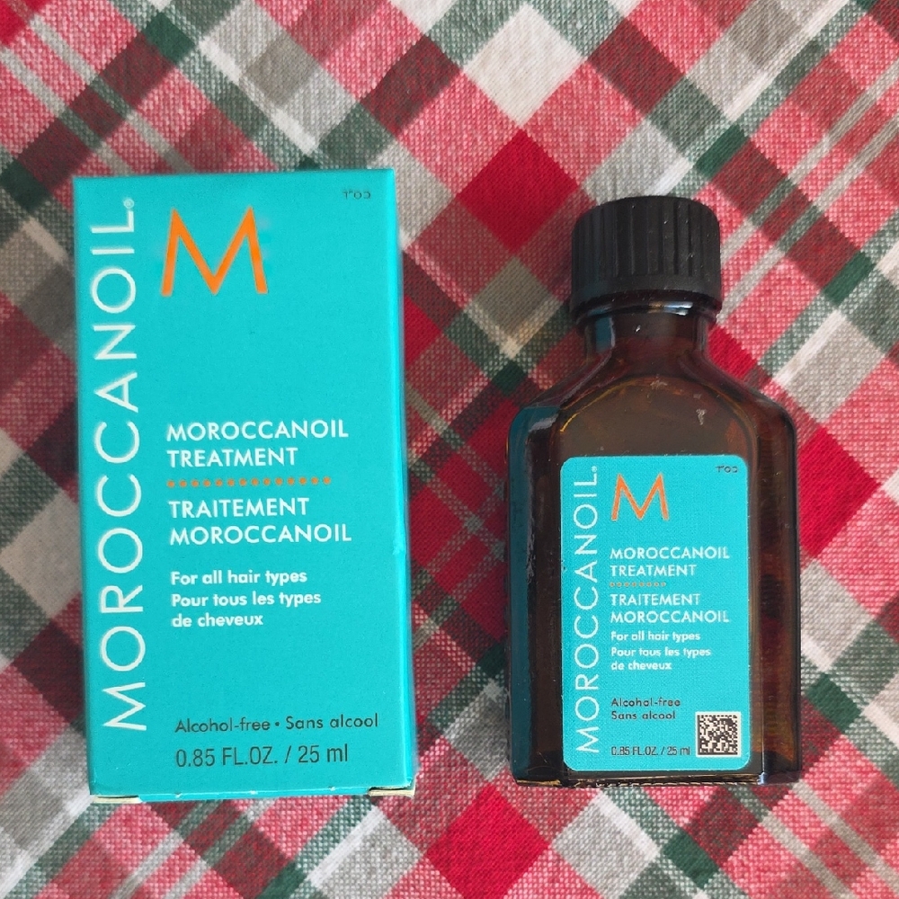 (2) Bottles Of Moroccanoil Hair Treatment in Turquoise and Brown